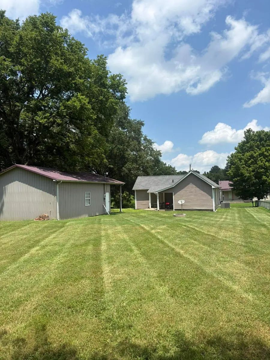 Professional striped lawn maintained by T&C Lawn Care in the Clarksville Tennessee area